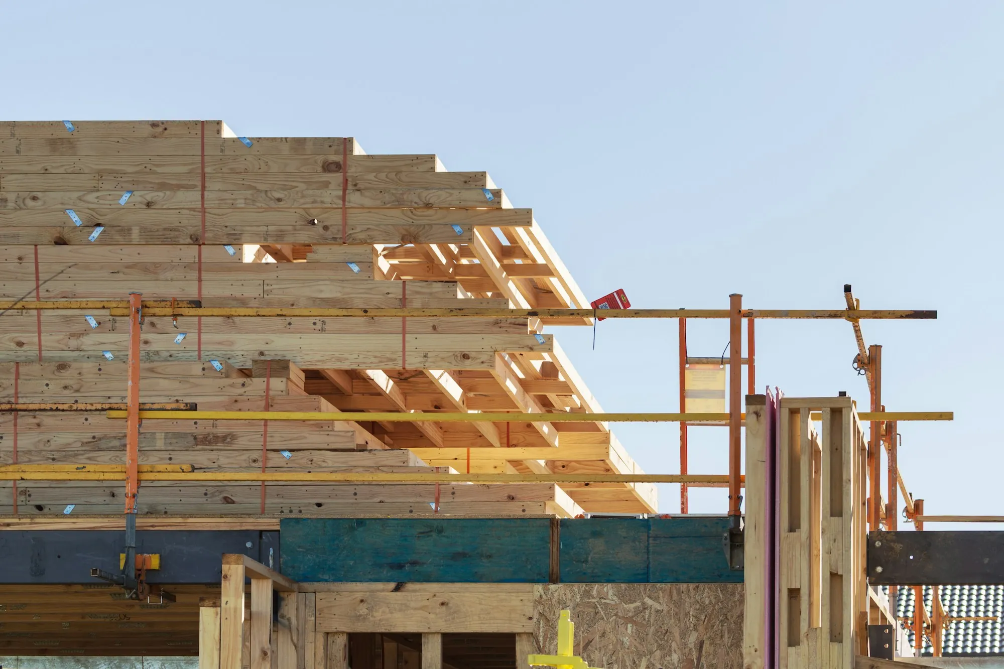 Wood framing and scaffolding on a house under construction