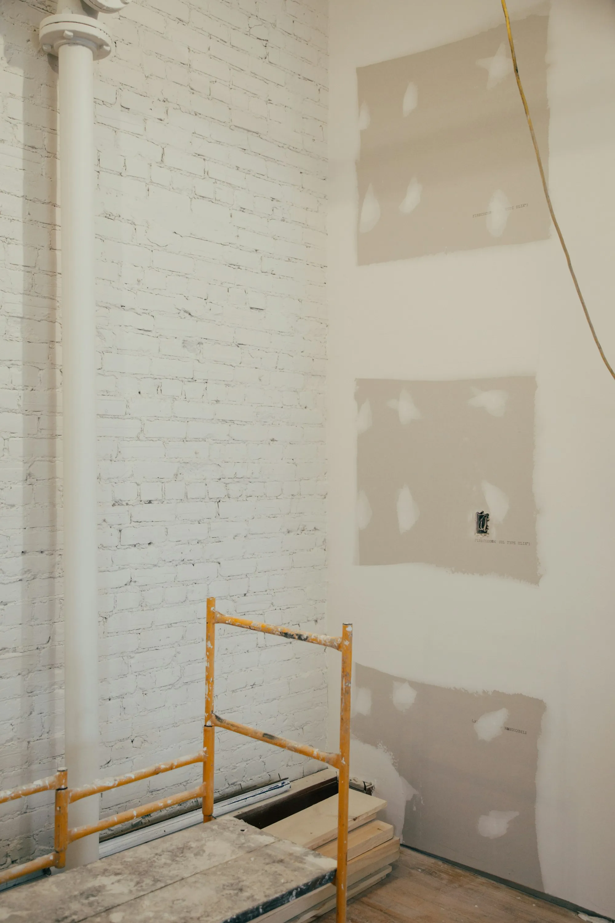 Interior wall work in progress during construction